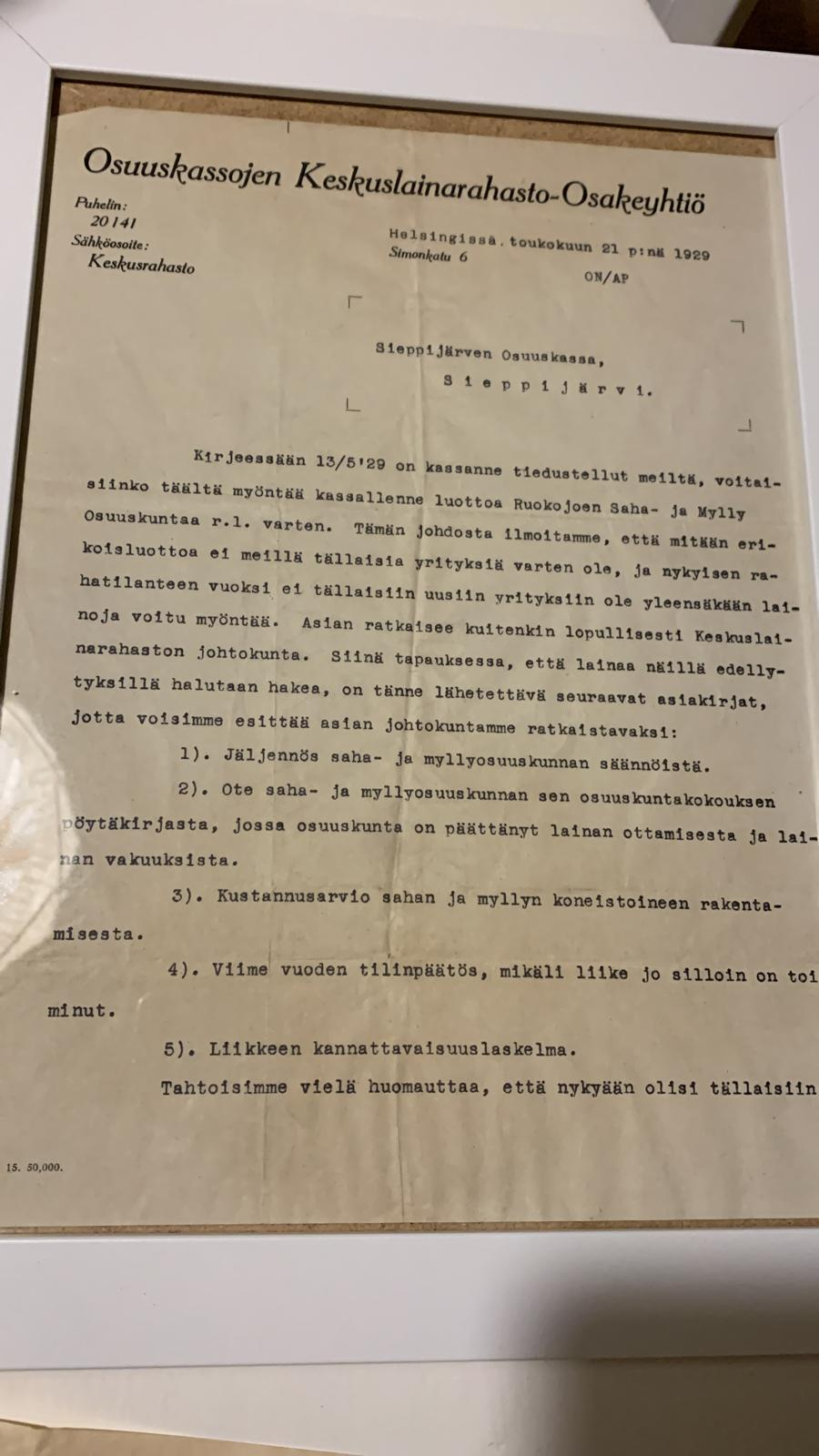 Framed 1929 letter from Osuuskassojen Keskuslainarahasto to Sieppijärvi Cooperative Credit Society about a loan for the Ruokojoki sawmill and mill